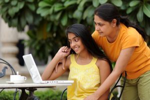 mom and daughter at computer